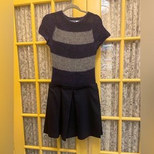 Adorable knit tennis dress from sportmax code. Knit top. Pleated bottom.